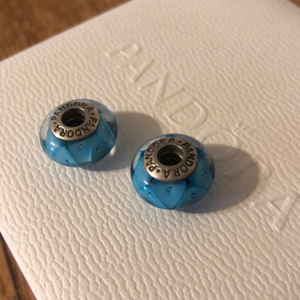 Pandora cushion charms